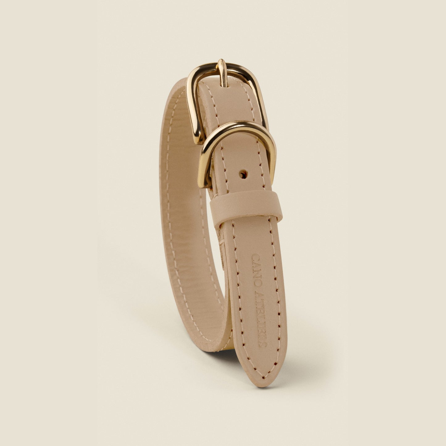 Stone taupe leather dog collar with gold hardware by Cano Ateliers