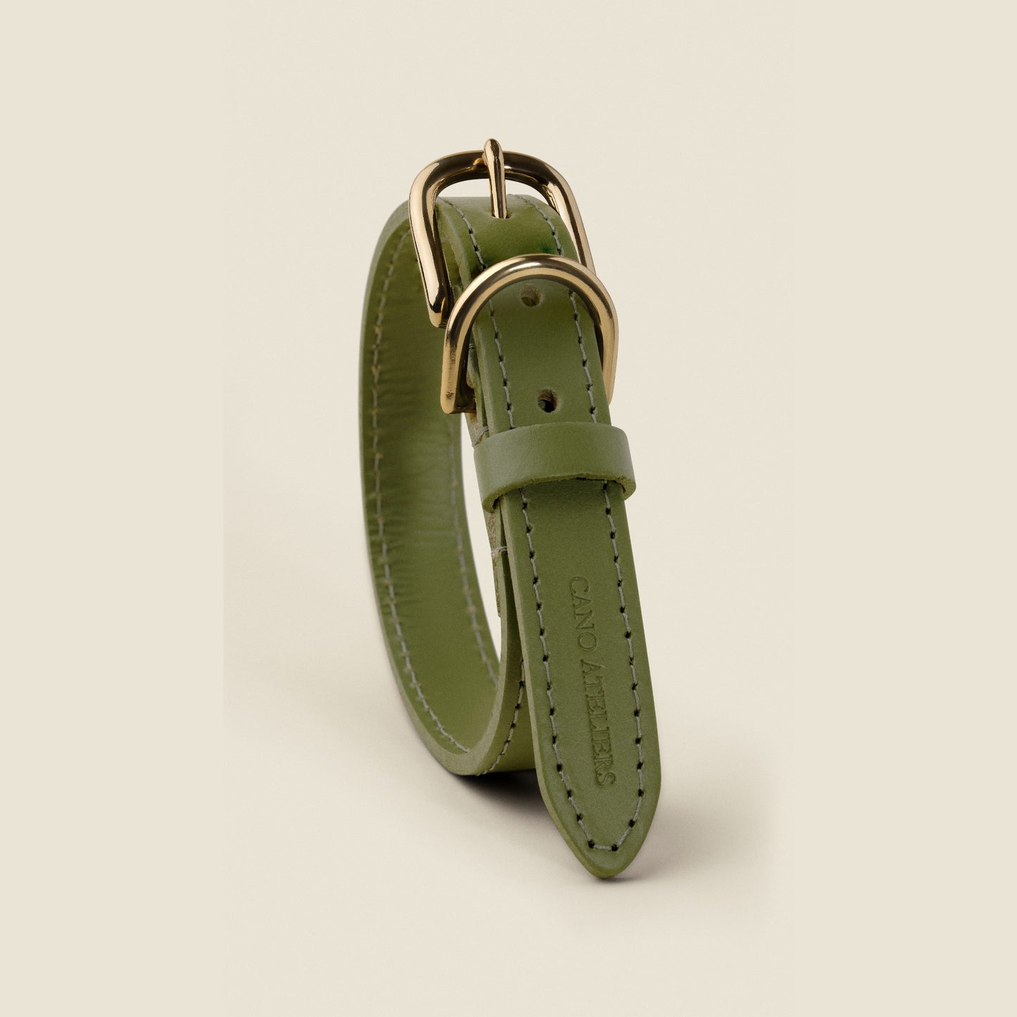 Stone green leather dog collar with gold hardware by Cano Ateliers