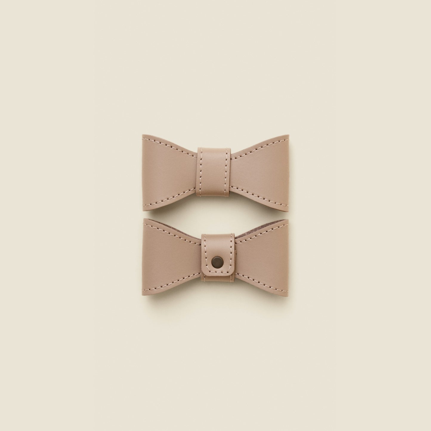 Removable taupe leather dog bowtie by Cano Ateliers