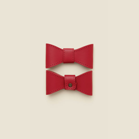 Removable red leather dog bowtie by Cano Ateliers