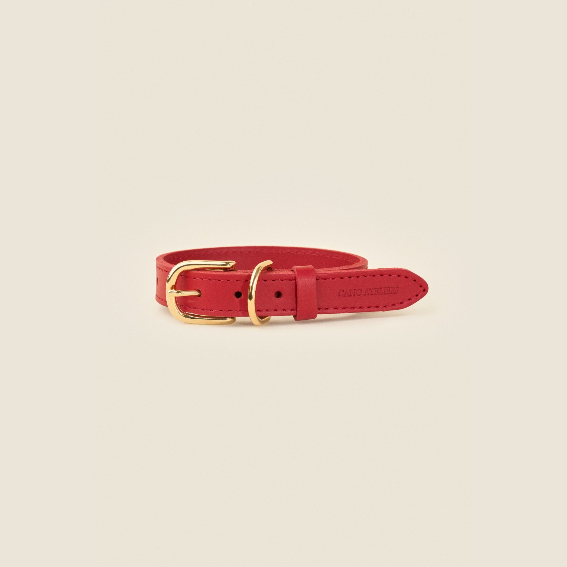 Stone red leather dog collar with gold hardware by Cano Ateliers