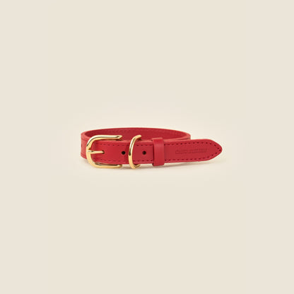 Stone red leather dog collar with gold hardware by Cano Ateliers