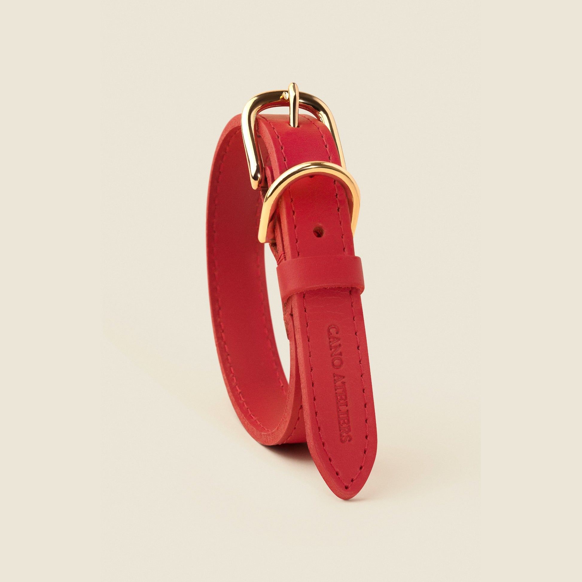 Stone red leather dog collar with gold hardware by Cano Ateliers