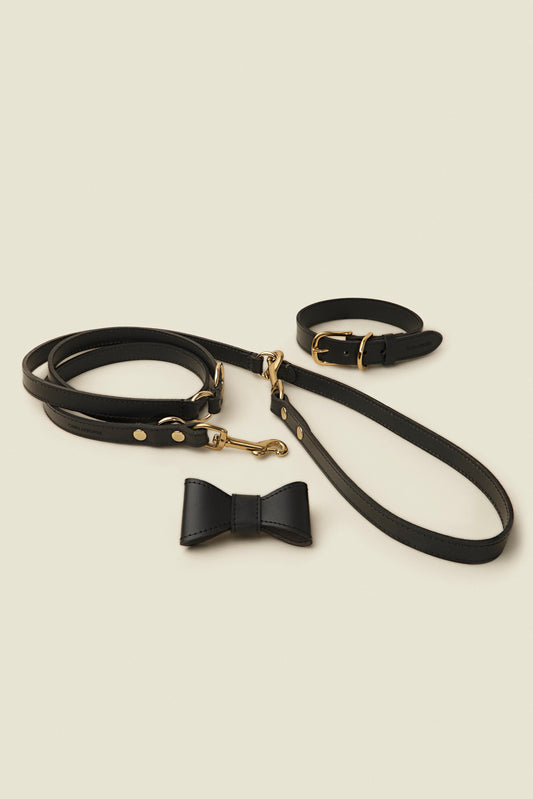 Matching black leather dog collar, leash and bowtie set by Cano Ateliers